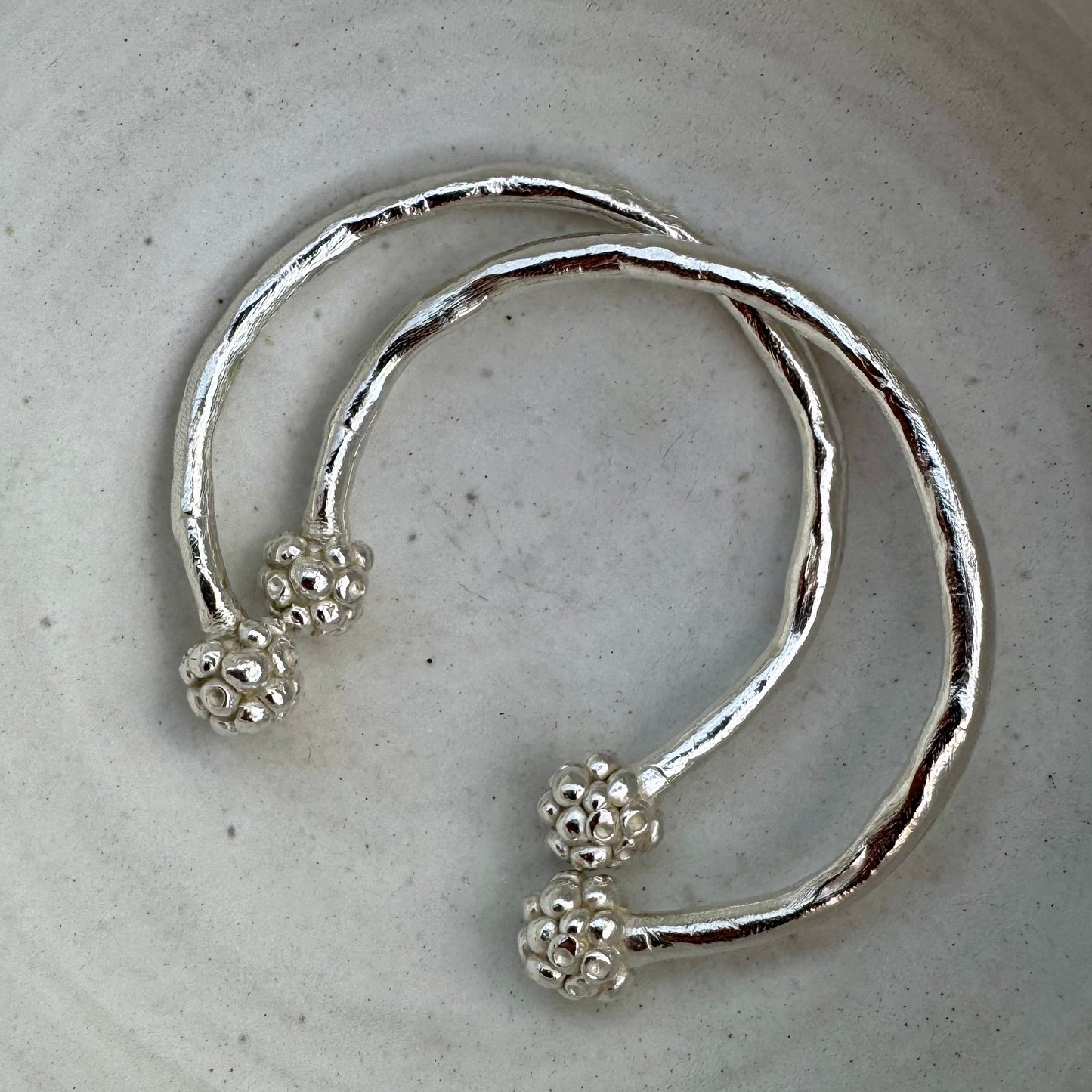 MORA CUFF: handmade and cast in recycled silver open cuffs with bobbles of smaller bobbles at the ends like blackberries. Fits all sizes.