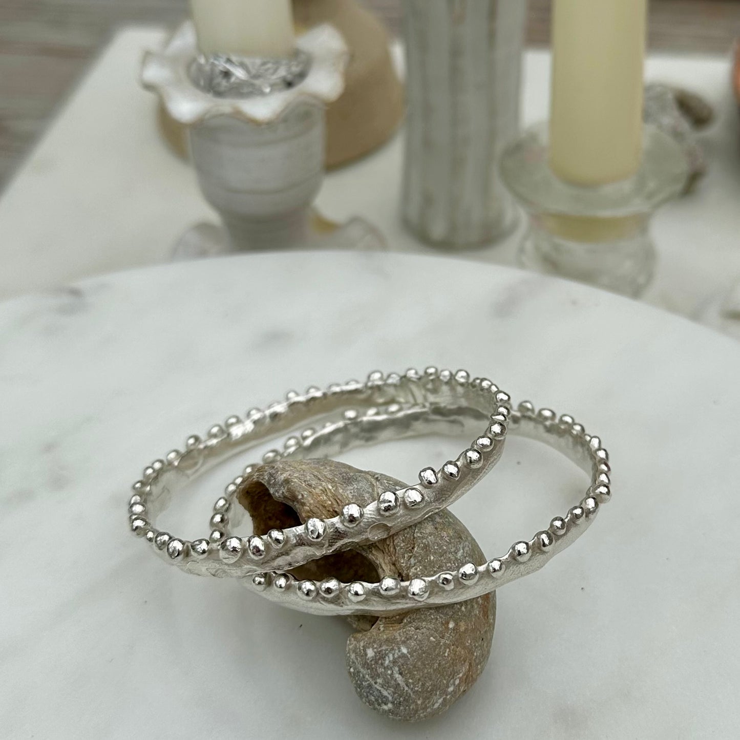 KELP BANGLES: Beautiful bobble edged bangles reminiscent of the frilly bobbly edged kelp seaweed. Handmade in wax and cast in recycled silver.