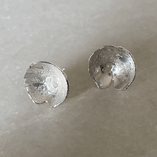 Ponds Studs: beautiful handmade organically shaped and domed recycled silver stud earrings.