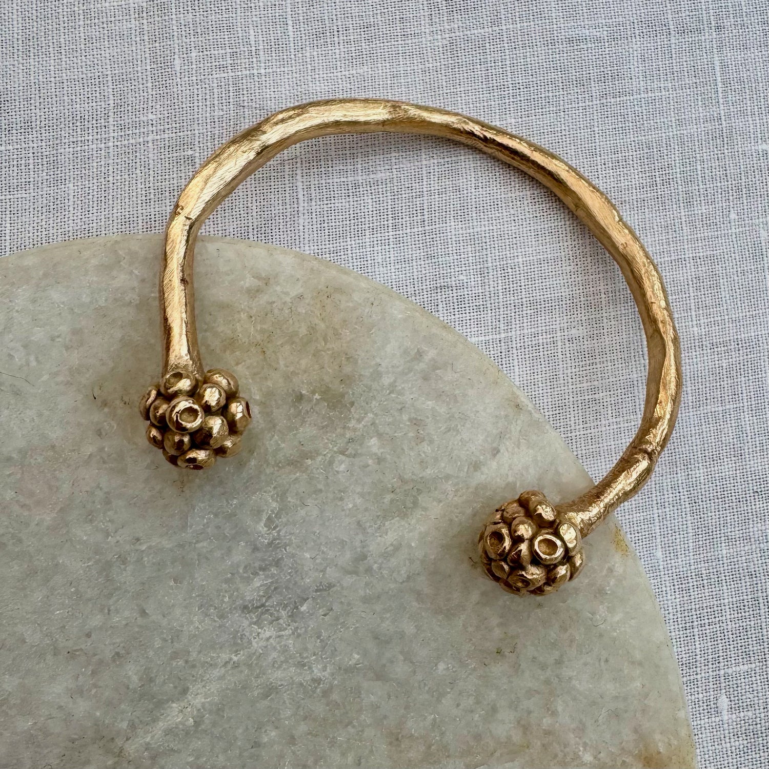 MORA CUFF: a handmade cast in recycled bronze open cuff with bobbles of smaller bobbles at the ends like blackberries. Fits all sizes.