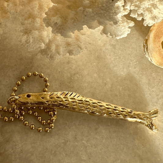 Fish Pendant: A gorgeous solid brass hand carved fish on a brass ball chain.