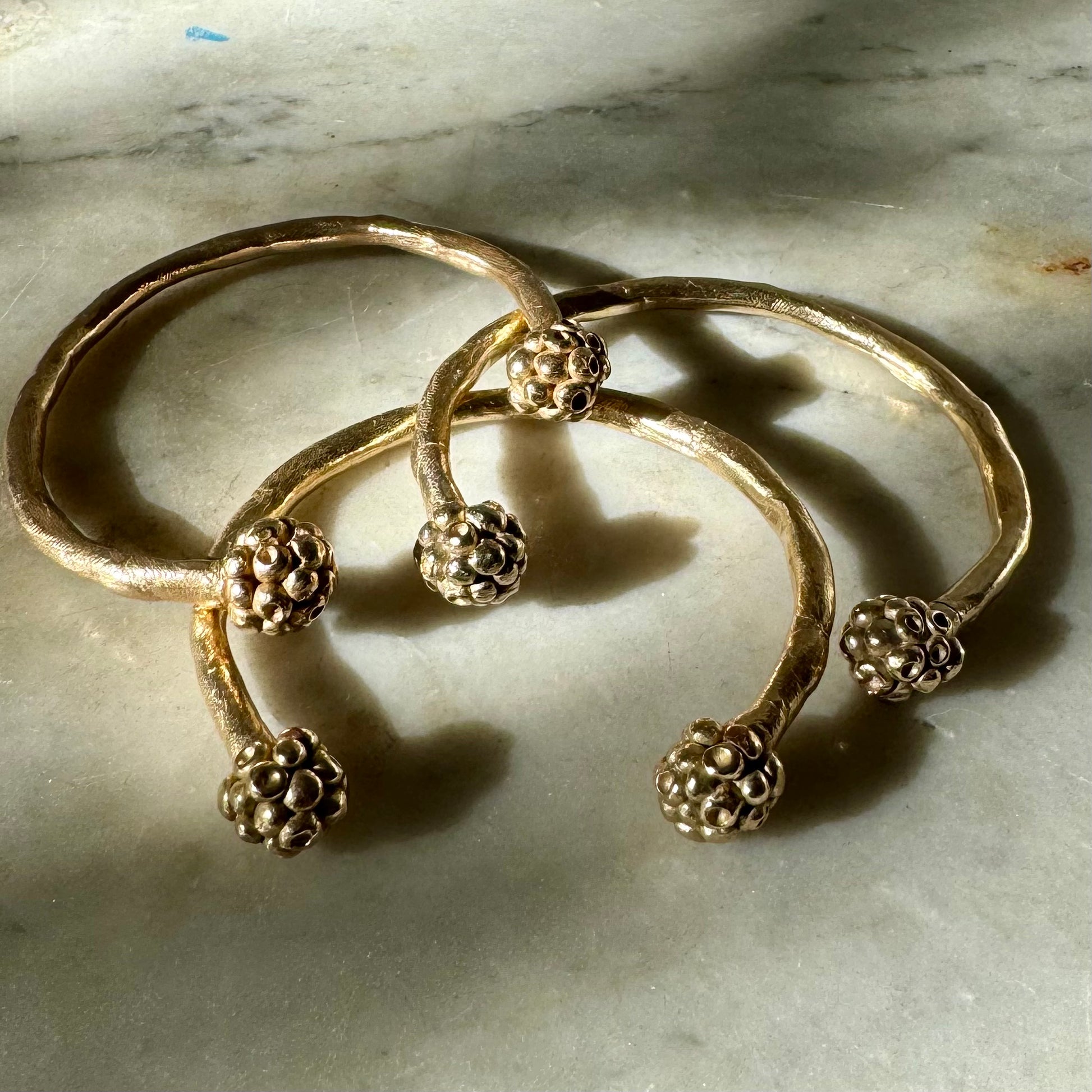MORA CUFF: handmade and cast in recycled bronze open cuffs with bobbles of smaller bobbles at the ends like blackberries. Fits all sizes.