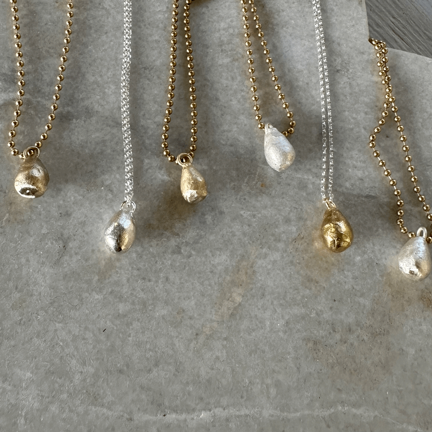 Pearly Dew Drop Necklace: A sweet little drop of solid recycled brass, or silver, on a recycled silver chain.