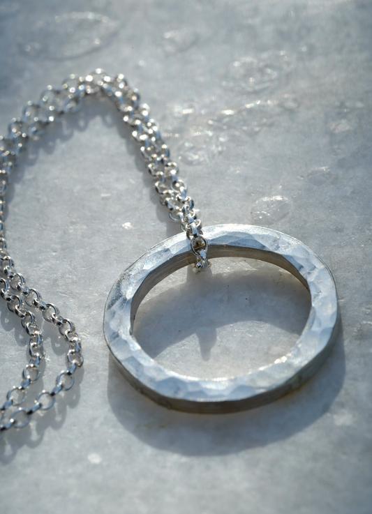 Gali Necklace: a simple and beautiful necklace with a hammered recycled silver circle on a recycled silver belcher chain.