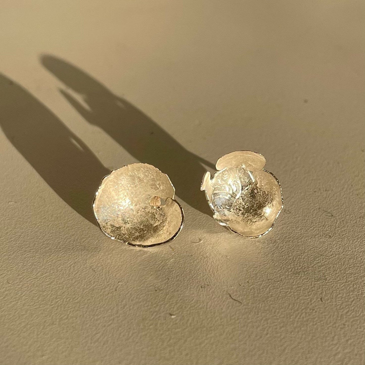 Ponds Studs: beautiful handmade organically shaped and domed recycled silver stud earrings.