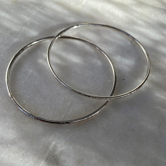 Textured Bangle: A handmade textured sturdy bangle in recycled silver