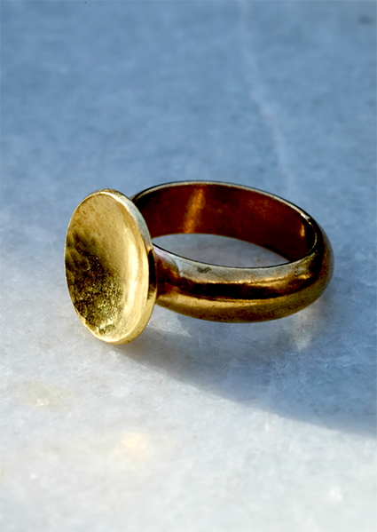Brass Sun Ring: a lovely hunky ring handmade from recycled brass with a slightly concave domed and hammered disc on a solid recycled brass ring shank. Inspired by the sun!