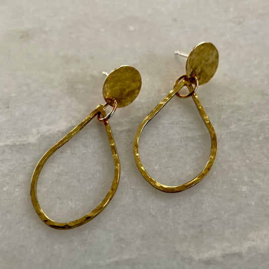 Zara Earrings: hammered recycled brass earrings with a disc and teardrop shaped outline.