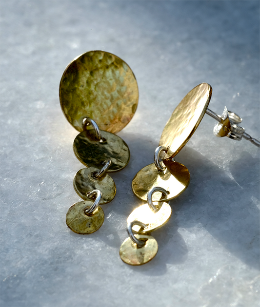 Emma Earrings: handmade earrings featuring graduated hammered recycled brass discs.