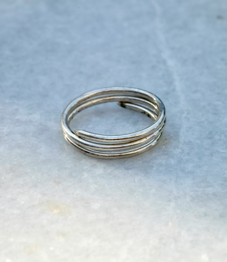Silver Smooth Spiral Ring: a simple ring consisting of a spiral of smooth recycled silver.
