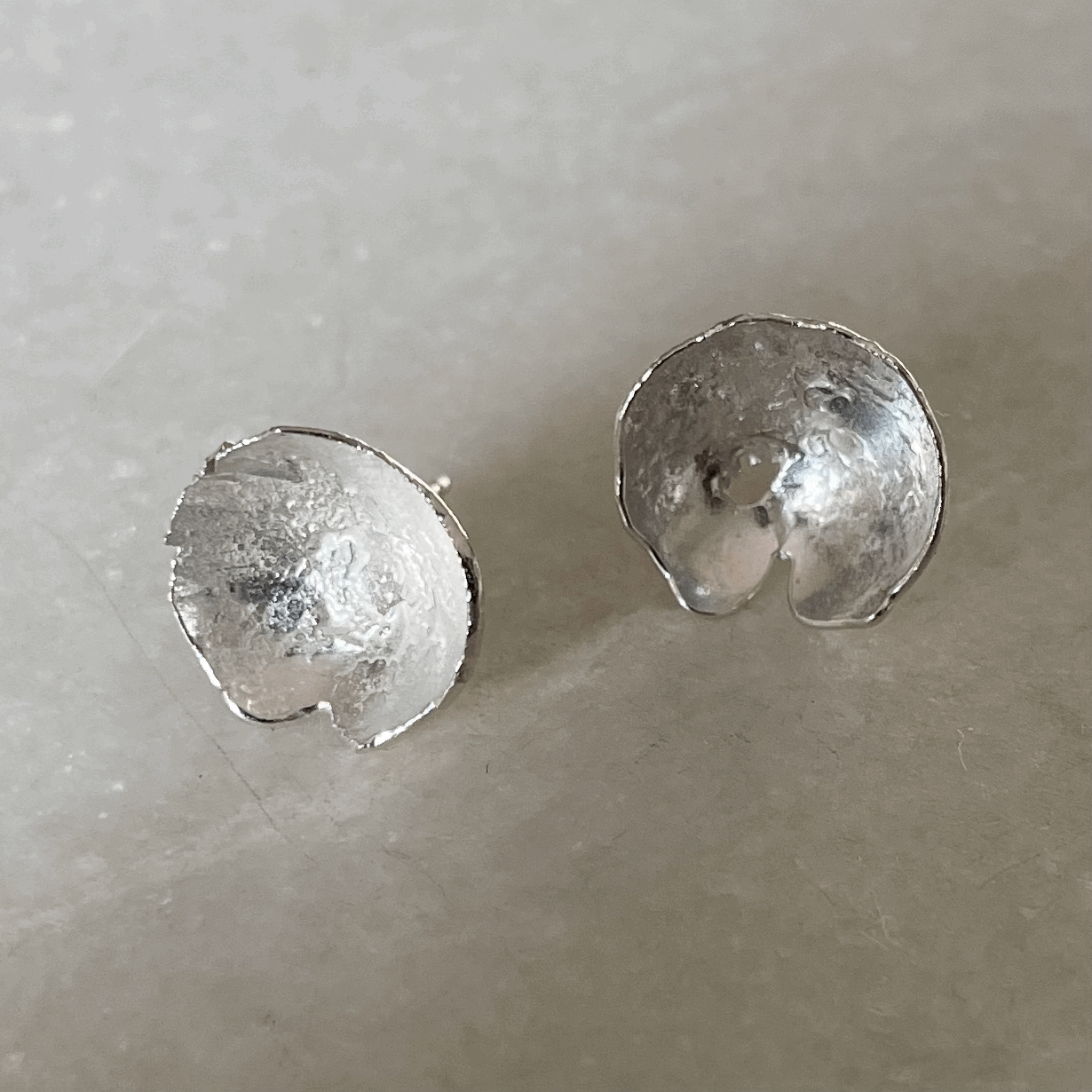 Ponds Studs: beautiful handmade organically shaped and domed recycled silver stud earrings.