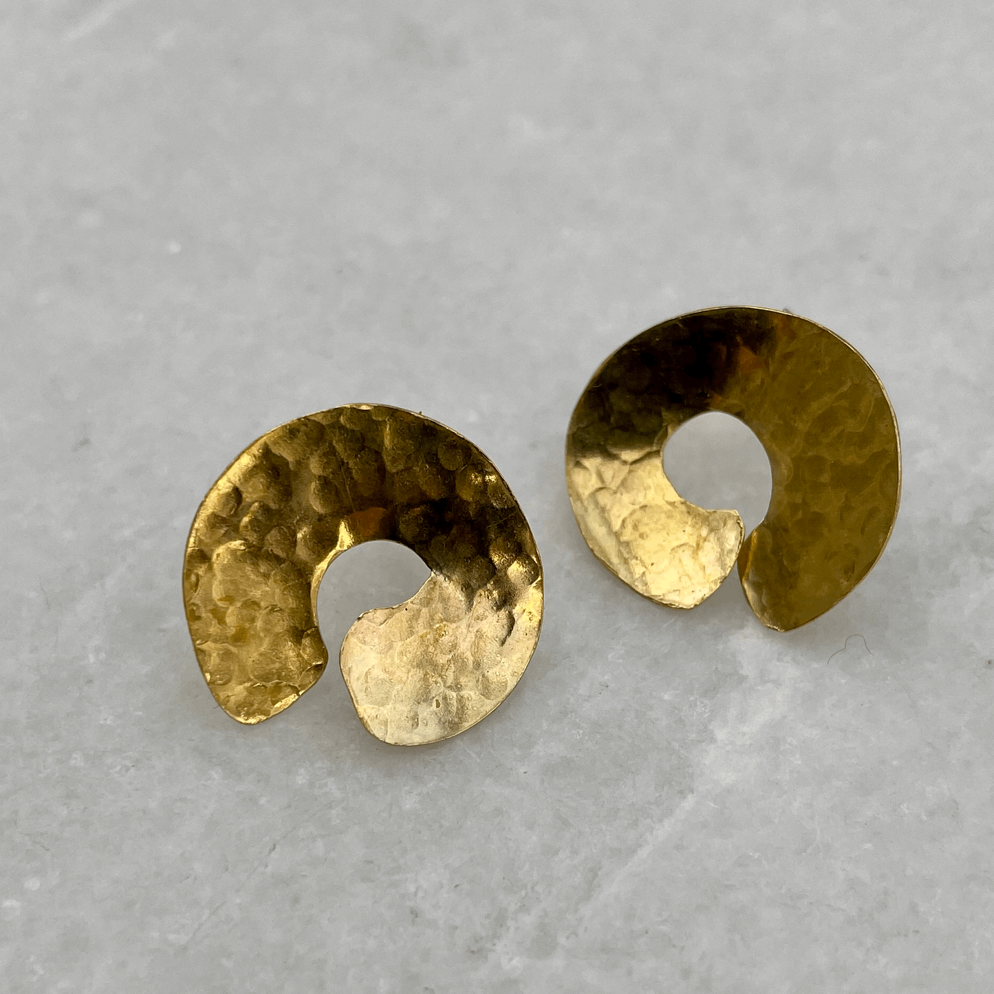 Codium Studs: handmade earrings in recycled brass, based on the shape of the ends of codium seaweed.